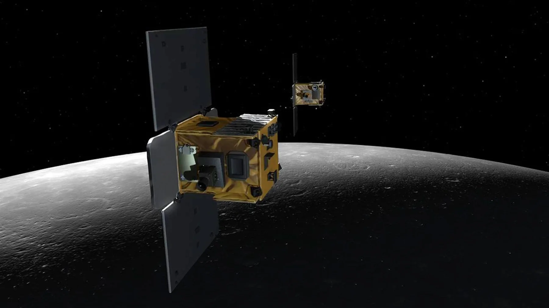 Artist concept of the twin GRAIL spacecraft flying above the Moon